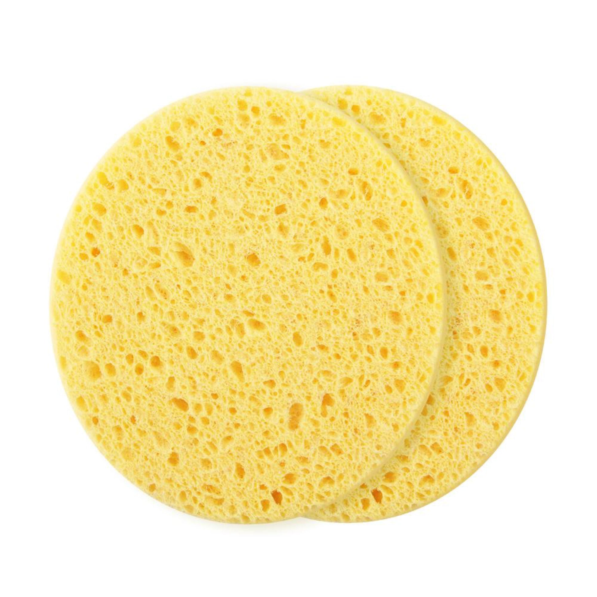 Two yellow sponges on a white background