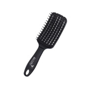 Black paddle hairbrush on a white background