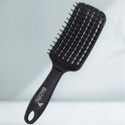 Black hairbrush with 'Belotty' branding on a light gray background