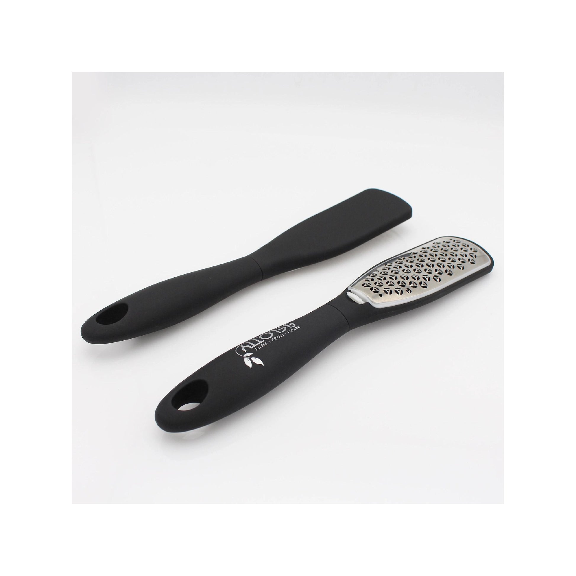Black foot scrubber with textured surface on a white background